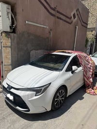 كورلا هايبرد 2024 شكل الامريكي ماشية 21 الف فول مواصفات عده لجلد ول كر...