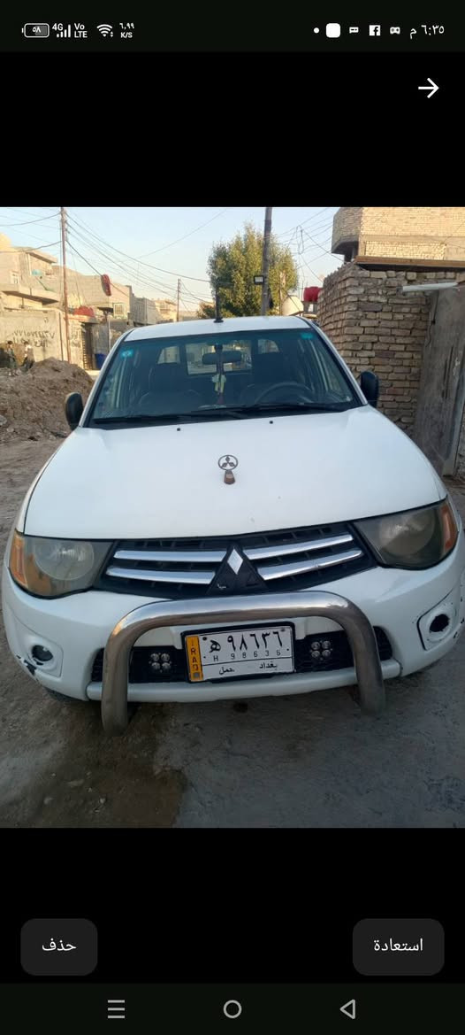 بيكب ميتسوبيشي موديل 2010 فور ويل محرك وكير بطة بيها صبغ جاملق خلف السائق سياره نظيفه خير من الله رقم بغداد الماني السعر 85 ورقة للاستفسار الاتصال على الرقم ***********  مكان السيارة بغداد حي الرحمة الشماعية
