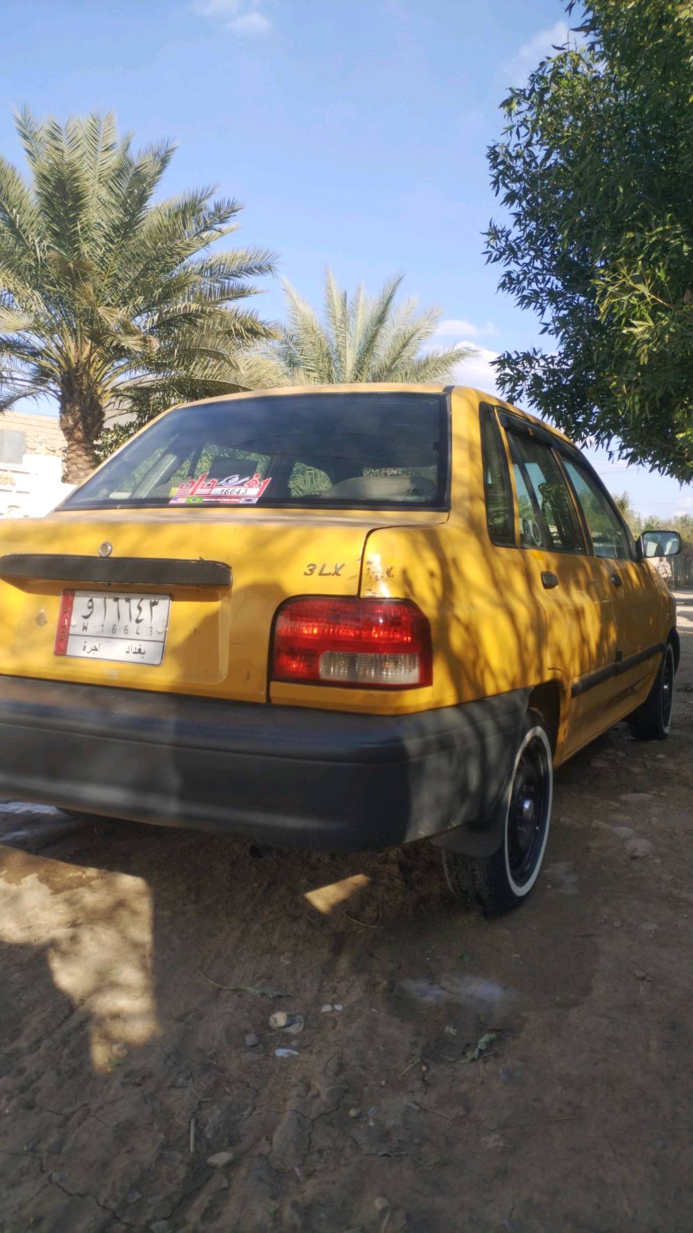 السياره موديل 2014 كير ومكينه وكلچ مكفول تبريد وتدفئة شغال هيئة وغرامة مصفرة موقع السياره بغداد الشعب 