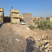 عندي قطعة ارض باسمي  ١٠٠ متر في مقاطعة ١٠/٣منطقة التراث خلف حي الاعلام...