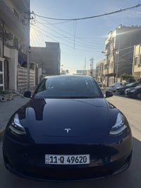 تسلا موديل y 2023 دبل ماطور داخل اسود رقم بغداد   اون لاين  حادث الباب...