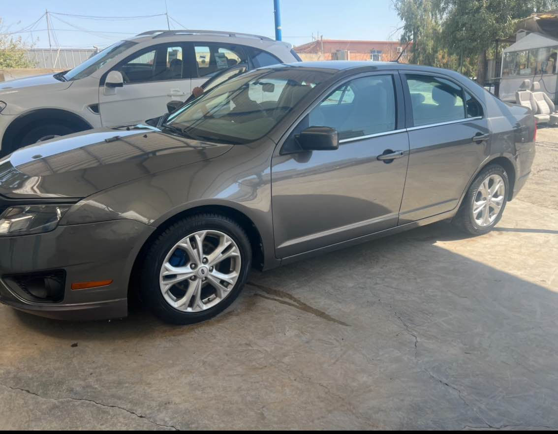 فورد فيوجن 12 بى بوياخ مه كينه ى دوونيو سه نه وتازه يه به شه رتى گيرو مه كينه و فه حس *********** السليمانية, العراق
