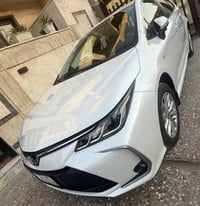تويوتا كورلا ساز هايبرد ٢٠٢٤جديده زيرو رقم بغداد ماشيه اقل من الف سبير...