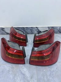 بكلايتات كيا كادنزا • ٢٠١١-٢٠١٣ • تفصيخ حاوية