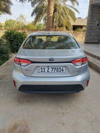 كورولا هايبرد موديل 24 السياره اي نقص ما بيها قطعه واحده صبغ البنيد صو...