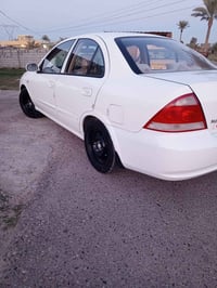 وبركاته   للبيع نيسان سني كوري موديل 2012 رقم بغداد انكليزي بأسمي تحوي...