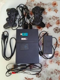 بلي ستيشن 2 سلم • ٢ چوستك • ٥٠+ لعبة