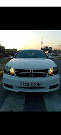 دوج افنجر موديل 2013 رقم بغداد باسمي سياره جديده وكل نقص ما بيهه ضرر ج...