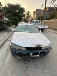 بيجو 406  موديل 2000 رقم بغداد مشروع وطني   السيارة بيها حادث ابيع على...