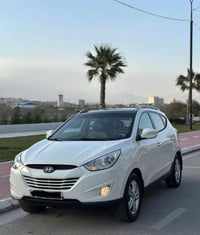 توسكون ٢٠١٠ • ٤ سلندر • باسمي