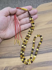 كهرب بلطيقي • وزن ١٤غ • قياس ٦.٩×٦.٧