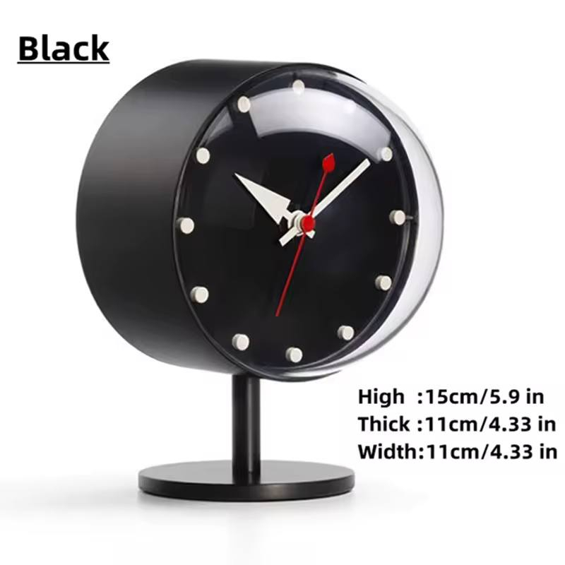 ساعة مكتب "نايت كلوك" (Night Clock) من فيترا بتصميم جورج نيلسون. تتميز بتصميم كلاسيكي من منتصف القرن العشرين مع وجه أسود وعقرب ثوانٍ أحمر مميز.صُنعت الساعة من النحاس والزجاج الأكريليكي عالي الجودة. تعمل بآلية كوارتز عالية الدقة وتأتي مع بطارية بقدرة 1.5 فولت.الأبعاد: يبلغ عرضها حوالي 10.5 سم وارتفاعها 15 سم.

التواصل عالخاص او واتساب ***********. يوجد توصيل لكل المحافظات.
