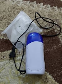 جهاز تسخين الشمع • سخان شمع