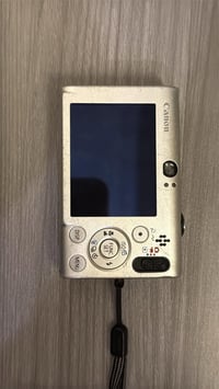 كانون SD1100 • خدوش • باب البطارية ناقص