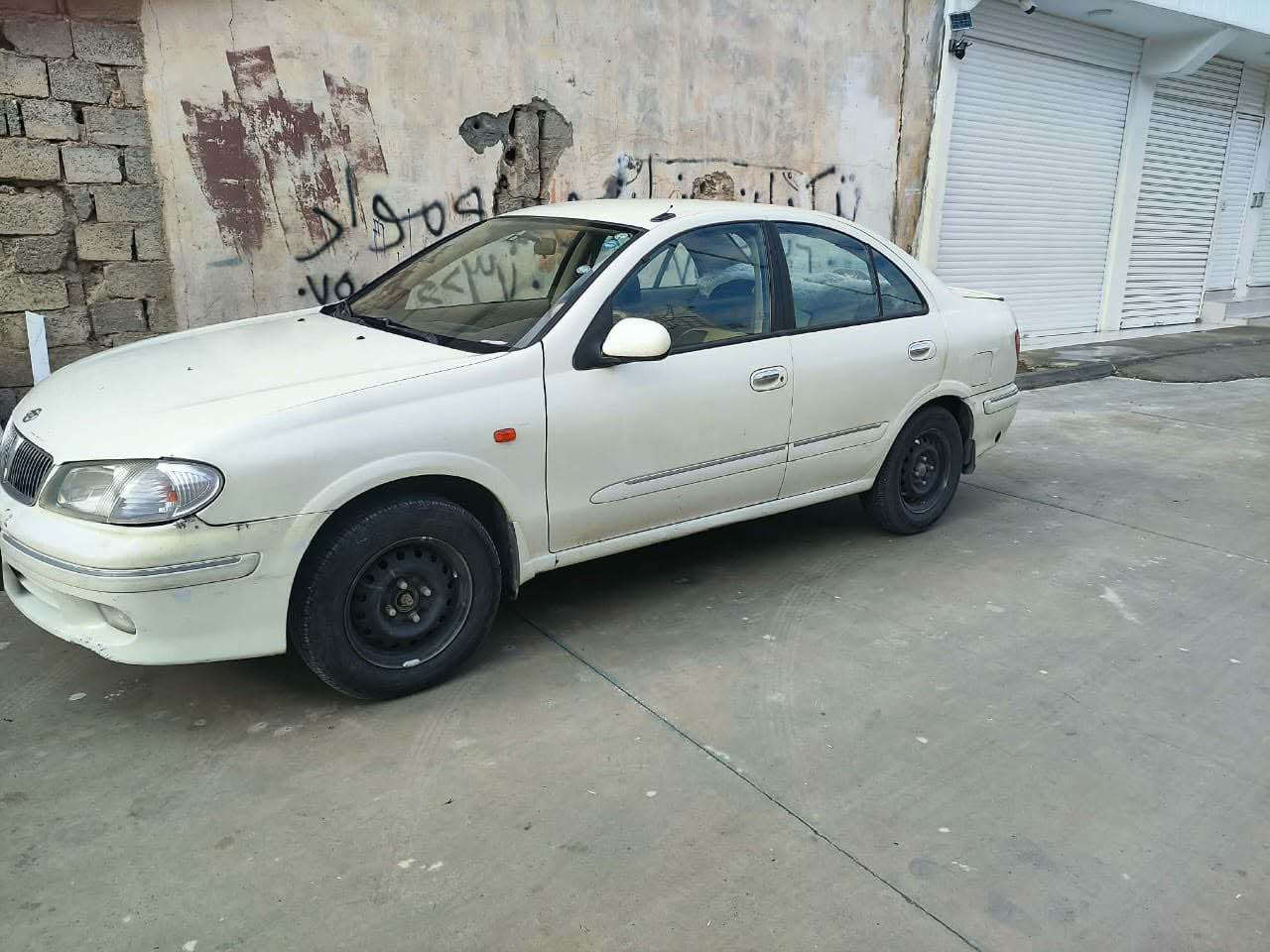 نيسان سه ني موديل ٢٠٠٢
گير عاديه سنوي نويه تا ٢٠٢٩
. گيرومه كينه به شه رت
٣ پارچه ي بوياغه بي ناو گرت
سعري ٧٣ معامه له 
*********** كويسينجاك, أربيل
