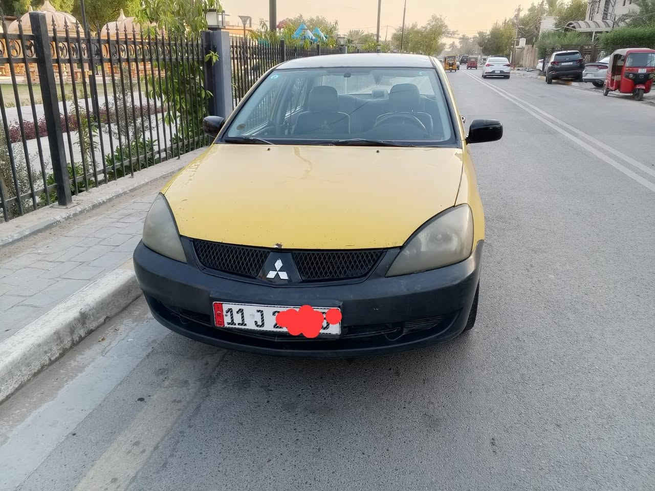 السلام عليكم لانسر الشركة العامة 
موديل ١٠  رقم انكليزي ما بيها ضربه السياره مصفرة هيئة وغرامات مكانه بغداد زعفرانيه *********** واتساب السعر ٦٣

