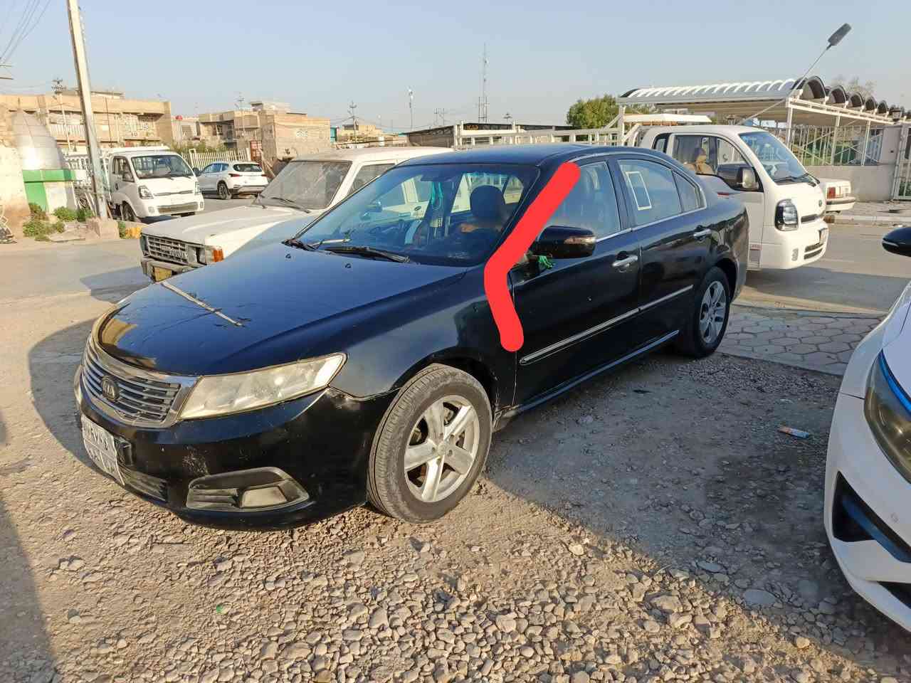 سلام عليكم  كيا لوتز للبيع   2009    محرك وكير جديد   بيها هاي التكمه الي مأشر عليها وجاملغ بدون دواخل   والباقي كفاله   رقم شمالي  تريد تحويل تريد وكاله  السعر 87 وبيها مجال حك الجيه  , ***********
