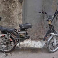 دراجة كهربائية • نقص بطاريات • بغداد