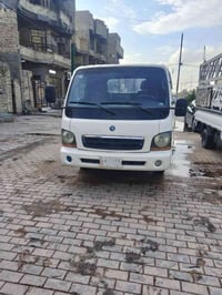 كيا ام عيون للبيع موديل 2000 رقم بغداد الماني سنويه 28 مكينه 3000 مفتو...