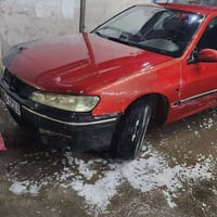 بيجو 406لون احمرمشمشي ممير موديل 2001سياره مكفوله من ضربه وصبغ عده طخه...