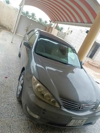 كامري ٢٠٠٣ وارد امريكي محرك ٢٤٠٠   رقم بغداد باسمي سنوية ٢٠٣٠  كير محر...
