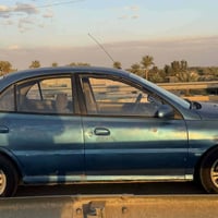 كيه ريو   رقم بغداد تحويل ثاني يوم  موديل 2003  كير مكينه كفاله   حداد...