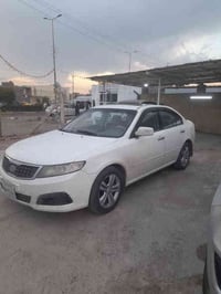 اوبتيما ٢٠١٠ • فتحه • حادث خلفي