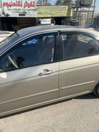 ا سبكترا موديل 2006 مصبوغه حزام ال جماليه  محركً200 سياره ب اسمي  0772...