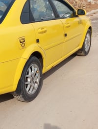 اوبترا موديل 2004 السيارة بلدي رقم بغداد الشرعي موجود عندي وكالة عامه ...
