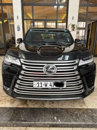 لكزس موديل 2024 رقم بغداد  ساز بلاتنيوم ماشيه 30 الف  مكفوله كفاله عام...