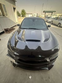 دوج جارجر RT 2018  بدون ايرباك حادثه تبديل باب وجاملغ جهة العبري ورصعه...