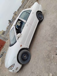 بروتون ٢٠٠٢ • رقم بابل • مكينه وگير عادي