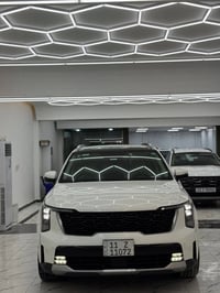 سورنتو موديل 2025 هايبرد  وكاله شركة اكدال  رقم بغداد  ماشيه 18,000  ع...