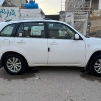 تيكو موديل ١٤  مكانها بغداد  مابيه أي صبغ فقط الهلال الخلفي جاملغ الاي...