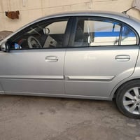 ريو  برايد موديل 2010 السيارة خليجي كير ومحرك جديد الرقم بغداد تبريد ش...