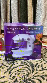 مكينة خياطة • أجهزة بيتية