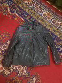 جاكيت جلد رجالي • مقاس L • بني غامق