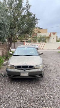 نوبيرا ستيشن • ١٩٩٧ • العلم