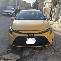 كورلا 2022 هايبرد للبيع  وارد امريكي ياباني اصلي  رقم بغداد اجرة  السي...