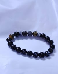 سوار • حجر النمر • حجر خشبي