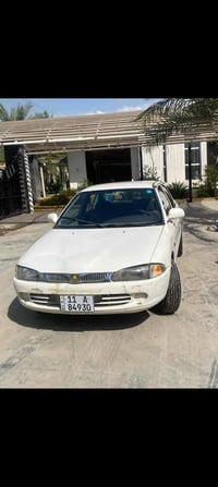 بروتون ويرا موديل 2002 سيارة بلادية فقط چاملغ خلفي صبغ سنوية بأسمي لسن...