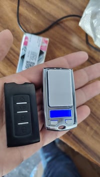 ميزان دقيق • أقل من غرام