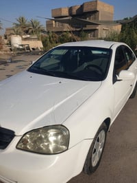 شوفر ليت اوبترا للبيع موديل 2012 رقم بغداد  اي استفسار اتصل  077190014...