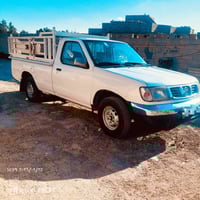 نيسان دبل • ٢٠٠٢ • فحص جديد