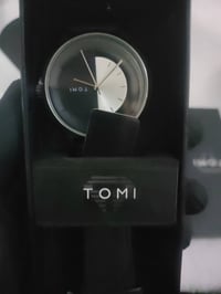 ساعة • ماركة تومي