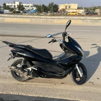 بي سي اكس 125 • الجيل الأول • الكوت الجديدة