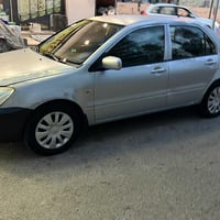 لانسر 2008 رقم اربيل  سنوية ورقم وهزة  وكير ومكينة جديد -  مكينة كبير ...