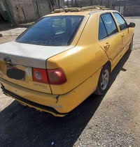 كوين للبيع 2010 مكينة معمره جديد السياره جاهزه  07704161191