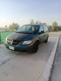 دوج كرفان 2007 كشن منفصل كير محرك شرط تبريد شغال طخم امامي وخلفي جديد ...