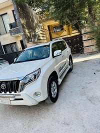 برادو موديل 2014 فول لون ابيض صدفي  TXL ماشيه 119حقيقي  بيه صبغ جنح ال...